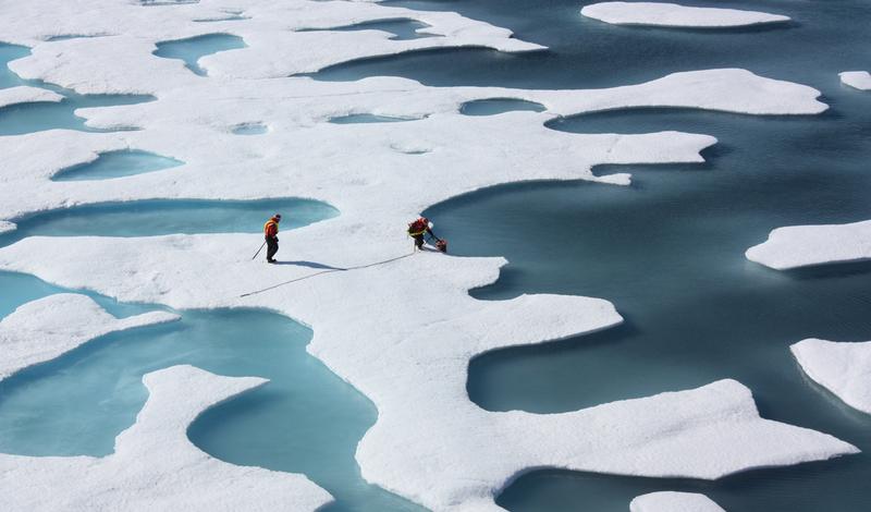 Researchers with NASA studying meltwater ponds atop Arctic sea ice. Image: NASA Goddard Spaceflight Center / Flickr